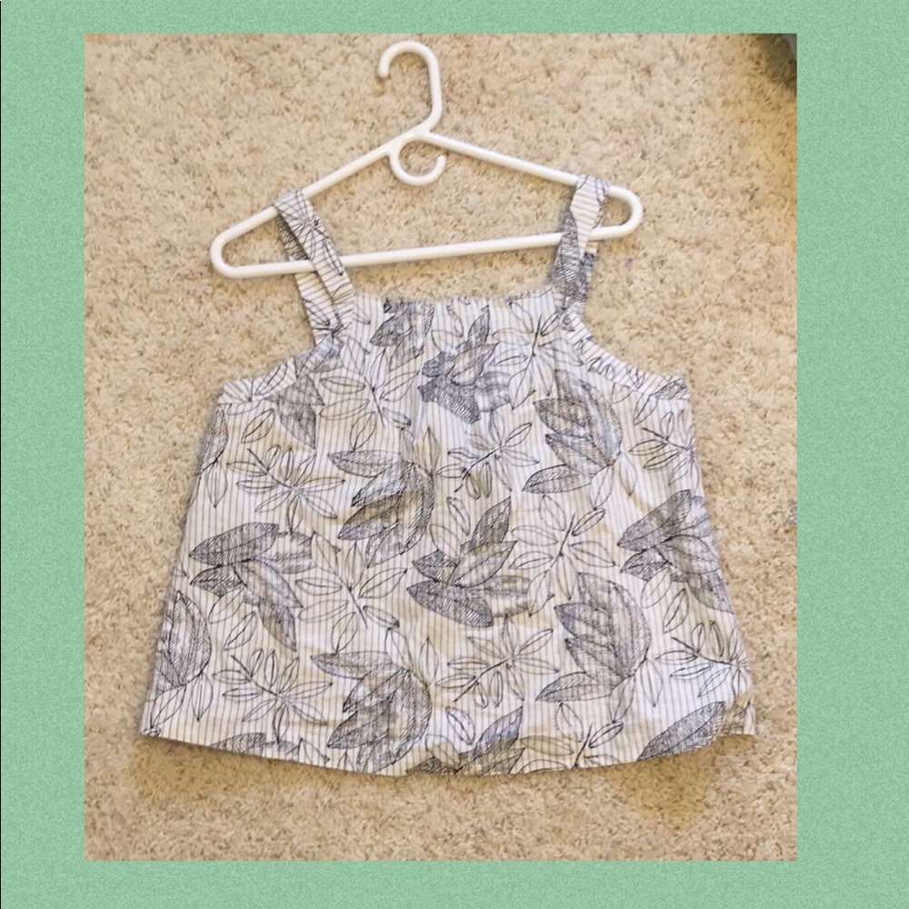 I am selling a dainty little tank top.